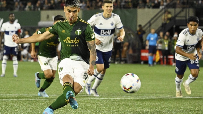 Jul 17, 2022; Portland, Oregon, USA;  Portland Timbers forward Felipe Mora (9) scores a goal off a penalty kick during the second half against the Portland Timbers at Providence Park. The game ended tied 1-1. Mandatory Credit: Troy Wayrynen-USA TODAY Sports