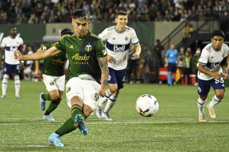 Jul 17, 2022; Portland, Oregon, USA;  Portland Timbers forward Felipe Mora (9) scores a goal off a penalty kick during the second half against the Portland Timbers at Providence Park. The game ended tied 1-1. Mandatory Credit: Troy Wayrynen-USA TODAY Sports