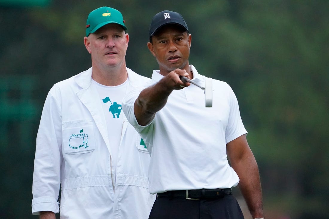 Tiger Woods talks with caddie Joe LaCava during a practice round at Augusta National.

Syndication Usa Today