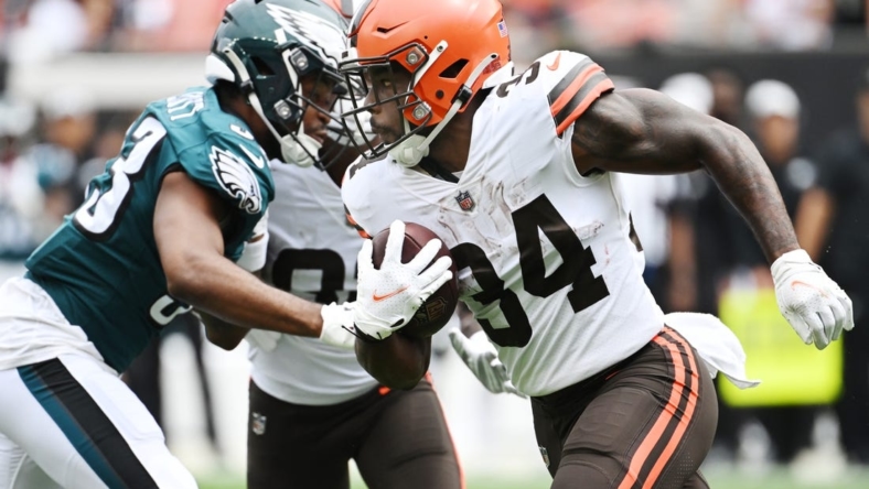 Aug 21, 2022; Cleveland, Ohio, USA; Cleveland Browns running back Jerome Ford (34) runs with the ball as Philadelphia Eagles cornerback Josiah Scott (33) defends during the first half at FirstEnergy Stadium. Mandatory Credit: Ken Blaze-USA TODAY Sports