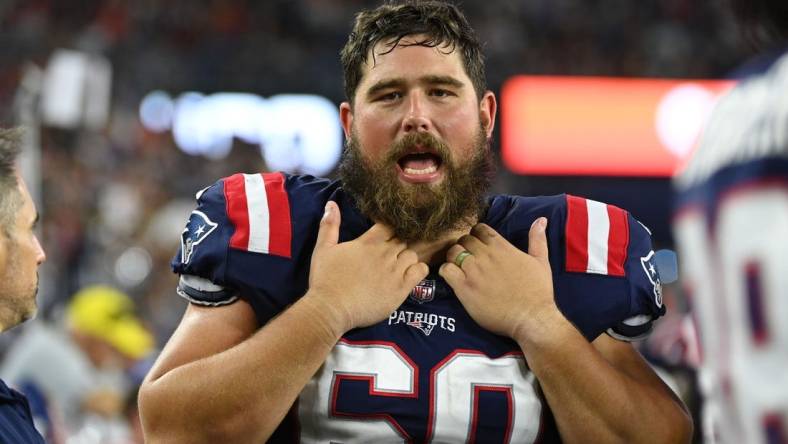 Aug 19, 2022; Foxborough, Massachusetts, USA; New England Patriots center David Andrews (60) on the sideline during the first half of a preseason game against the Carolina Panthers at Gillette Stadium. Mandatory Credit: Eric Canha-USA TODAY Sports