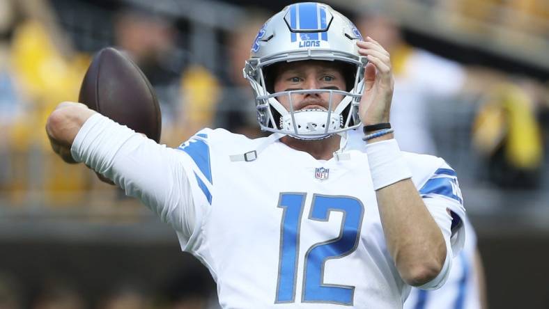 Aug 28, 2022; Pittsburgh, Pennsylvania, USA;  Detroit Lions quarterback Tim Boyle (12) warms up before the game against the Pittsburgh Steelers at Acrisure Stadium. Mandatory Credit: Charles LeClaire-USA TODAY Sports