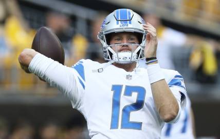 Aug 28, 2022; Pittsburgh, Pennsylvania, USA;  Detroit Lions quarterback Tim Boyle (12) warms up before the game against the Pittsburgh Steelers at Acrisure Stadium. Mandatory Credit: Charles LeClaire-USA TODAY Sports