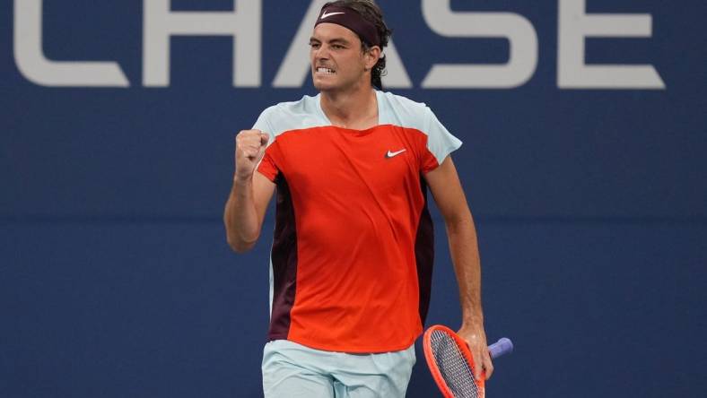 Aug 29, 2022; Flushing, NY, USA;  Taylor Fritz of the United States celebrates after winning a point against Brandon Holt of the United States on day one of the 2022 U.S. Open tennis tournament at USTA Billie Jean King National Tennis Center. Mandatory Credit: Jerry Lai-USA TODAY Sports