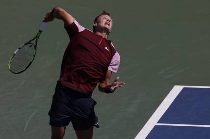 Sep 3, 2022; Flushing, NY, USA; Holger Rune (DEN) serves against Cameron Norrie (GBR) (not pictured) on day six of the 2022 U.S. Open tennis tournament at USTA Billie Jean King Tennis Center. Mandatory Credit: Geoff Burke-USA TODAY Sports