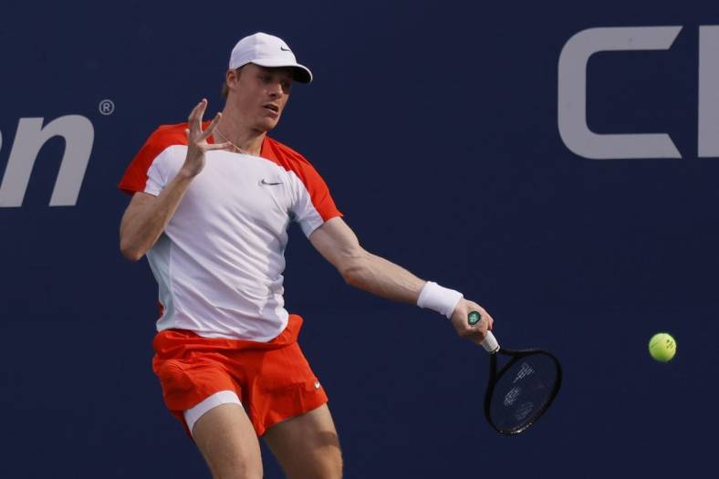 Sep 3, 2022; Flushing, NY, USA; Denis Shapovalov (CAN) hits a forehand against Andrey Rublev (not pictured) on day six of the 2022 U.S. Open tennis tournament at USTA Billie Jean King Tennis Center. Mandatory Credit: Geoff Burke-USA TODAY Sports