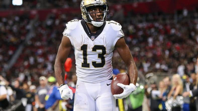 Sep 11, 2022; Atlanta, Georgia, USA; New Orleans Saints wide receiver Michael Thomas (13) celebrates after a touchdown against the Atlanta Falcons in the fourth quarter at Mercedes-Benz Stadium. Mandatory Credit: Brett Davis-USA TODAY Sports