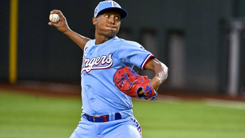 Sep 11, 2022; Arlington, Texas, USA; Texas Rangers relief pitcher Jose Leclerc (25) pitches against the Toronto Blue Jays during the ninth inning at Globe Life Field. Mandatory Credit: Jerome Miron-USA TODAY Sports