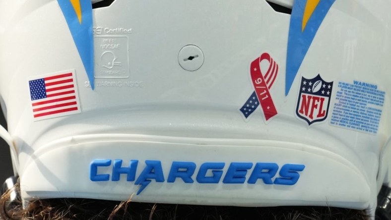 Sep 11, 2022; Inglewood, California, USA; A detailed view of the 9/11 ribbon logo on the back of the helmet of Los Angeles Chargers quarterback Justin Herbert (10) during the game against the Las Vegas Raiders at SoFi Stadium. Mandatory Credit: Kirby Lee-USA TODAY Sports