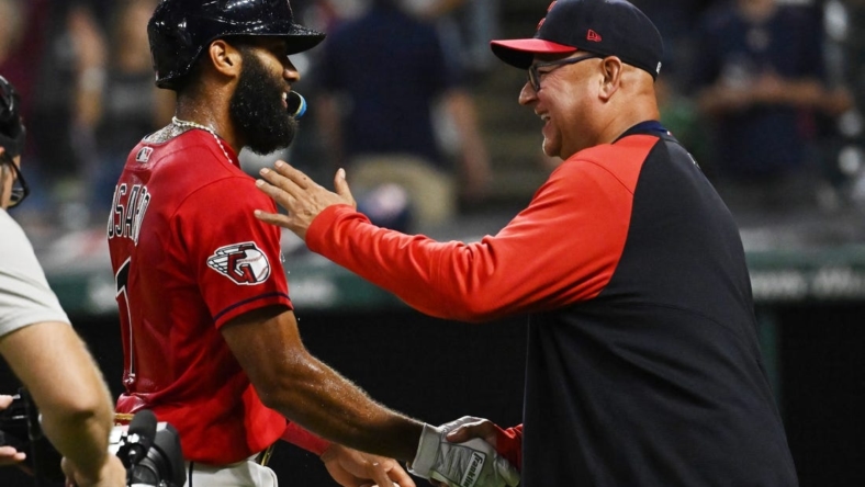 Sep 17, 2022; Cleveland, Ohio, USA; Cleveland Guardians shortstop Amed Rosario celebrates with manager Terry Francona, right, after hitting an RBI single to win the game during the fifteenth inning against the Minnesota Twins at Progressive Field. Mandatory Credit: Ken Blaze-USA TODAY Sports