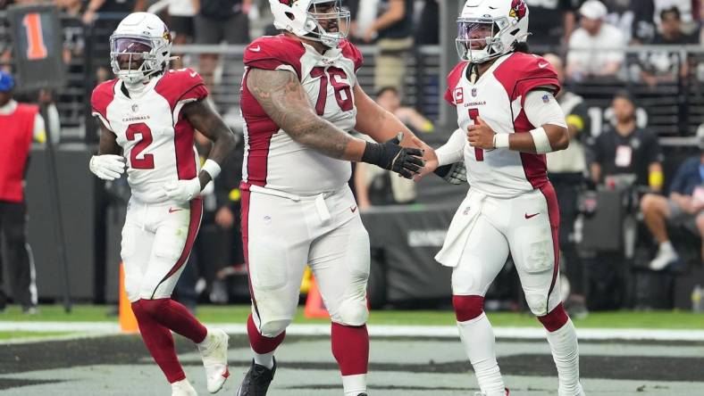 Sep 18, 2022; Paradise, Nevada, USA; Arizona Cardinals quarterback Kyler Murray (1) celebrates with Arizona Cardinals guard Will Hernandez (76) after scoring a rushing touchdown against the Las Vegas Raiders at Allegiant Stadium. Mandatory Credit: Stephen R. Sylvanie-USA TODAY Sports