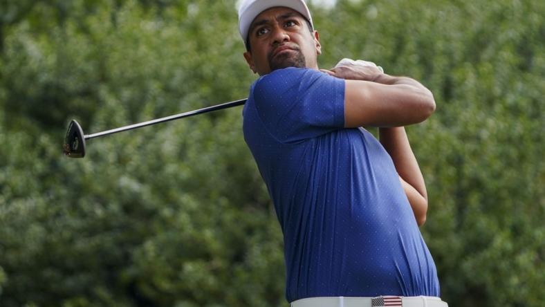 Sep 24, 2022; Charlotte, North Carolina, USA; Team USA golfer Tony Finau hits his tee shot on the 11th hole during the four-ball match play of the Presidents Cup golf tournament at Quail Hollow Club. Mandatory Credit: Peter Casey-USA TODAY Sports