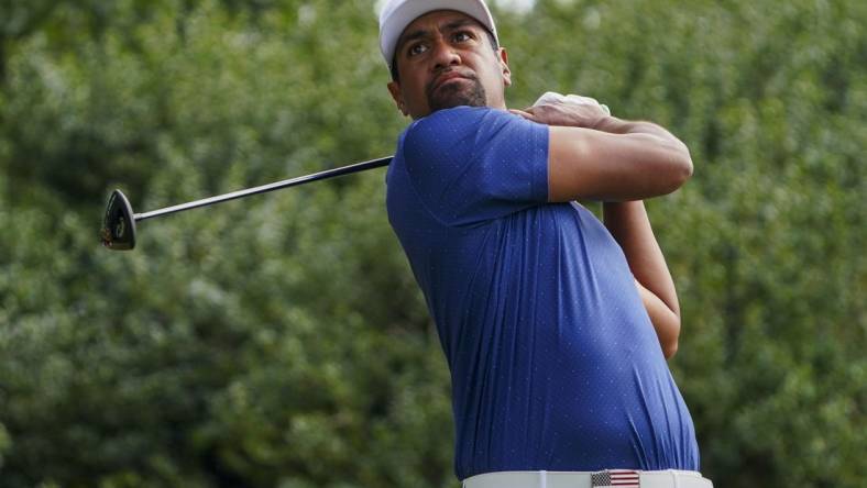 Sep 24, 2022; Charlotte, North Carolina, USA; Team USA golfer Tony Finau hits his tee shot on the 11th hole during the four-ball match play of the Presidents Cup golf tournament at Quail Hollow Club. Mandatory Credit: Peter Casey-USA TODAY Sports