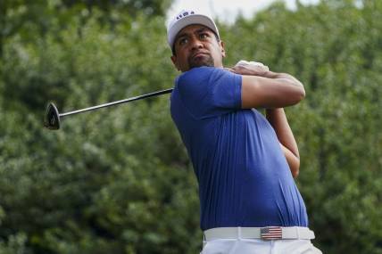 Sep 24, 2022; Charlotte, North Carolina, USA; Team USA golfer Tony Finau hits his tee shot on the 11th hole during the four-ball match play of the Presidents Cup golf tournament at Quail Hollow Club. Mandatory Credit: Peter Casey-USA TODAY Sports
