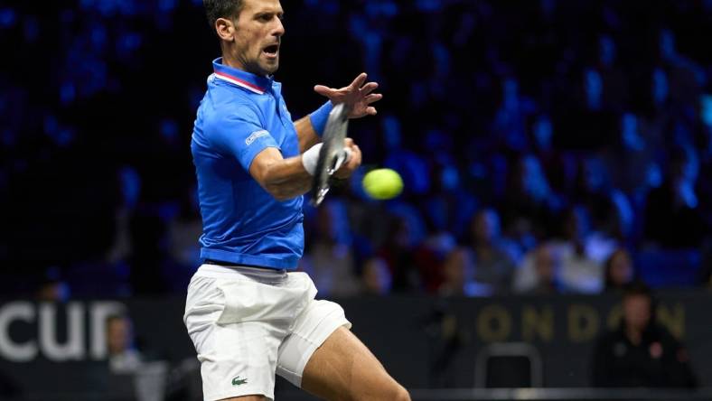 Sep 25, 2022; London, United Kingdom; Novak Djokovic (SRB) plays a shot against Felix Auger-Aliassime (CAN) in Lavers Cup singles. Mandatory Credit: Peter van den Berg-USA TODAY Sports