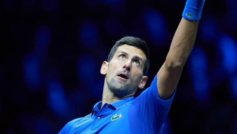 Sep 25, 2022; London, United Kingdom; Novak Djokovic (SRB) serves against Felix Auger-Aliassime (CAN) in Lavers Cup singles. Mandatory Credit: Peter van den Berg-USA TODAY Sports