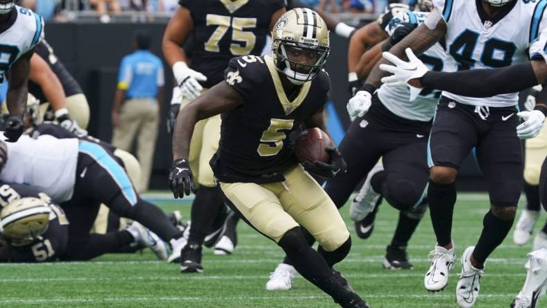 Sep 25, 2022; Charlotte, North Carolina, USA; New Orleans Saints wide receiver Jarvis Landry (5) runs with the ball against the Carolina Panthers during the first quarter at Bank of America Stadium. Mandatory Credit: James Guillory-USA TODAY Sports