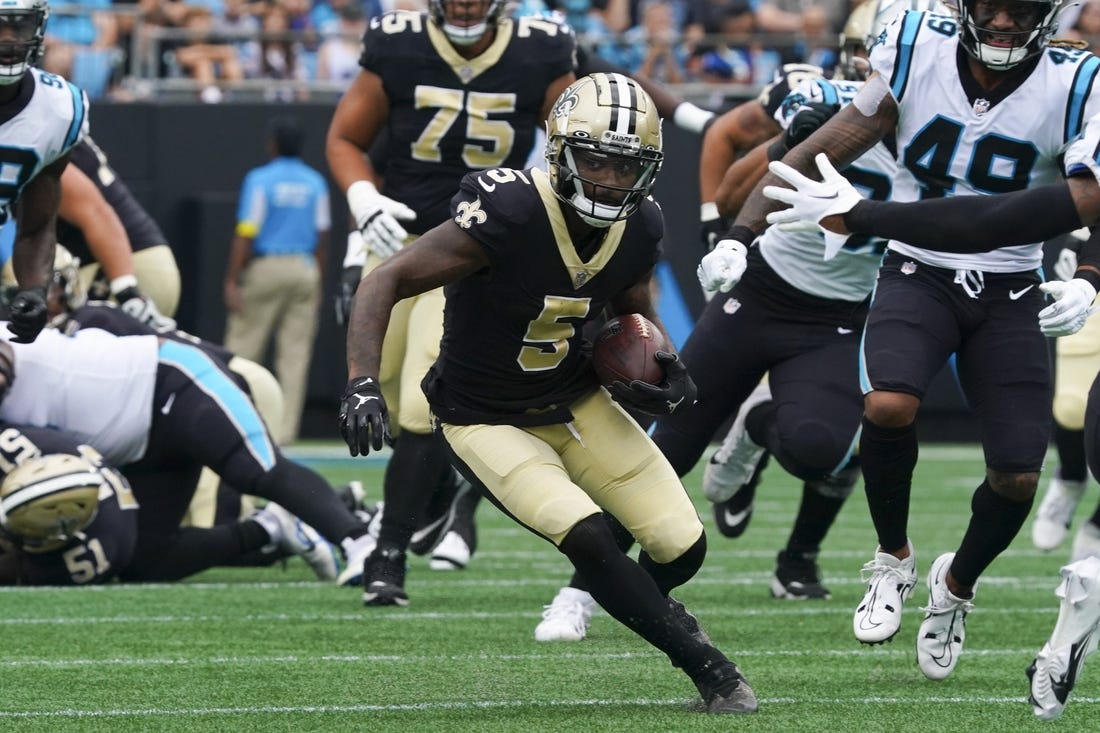 Sep 25, 2022; Charlotte, North Carolina, USA; New Orleans Saints wide receiver Jarvis Landry (5) runs with the ball against the Carolina Panthers during the first quarter at Bank of America Stadium. Mandatory Credit: James Guillory-USA TODAY Sports
