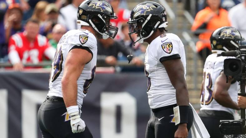 Sep 25, 2022; Foxborough, Massachusetts, USA; Baltimore Ravens quarterback Lamar Jackson (8) and Baltimore Ravens tight end Mark Andrews (89) celebrate after a touchdown during the first half against the New England Patriots at Gillette Stadium. Mandatory Credit: Paul Rutherford-USA TODAY Sports