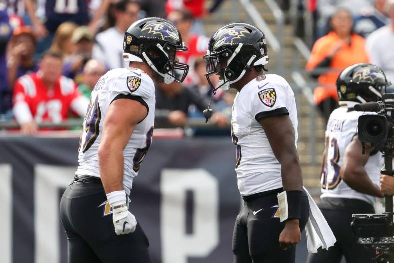 Sep 25, 2022; Foxborough, Massachusetts, USA; Baltimore Ravens quarterback Lamar Jackson (8) and Baltimore Ravens tight end Mark Andrews (89) celebrate after a touchdown during the first half against the New England Patriots at Gillette Stadium. Mandatory Credit: Paul Rutherford-USA TODAY Sports