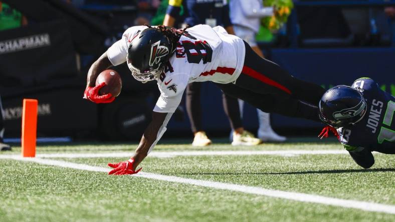 Sep 25, 2022; Seattle, Washington, USA; Atlanta Falcons running back Cordarrelle Patterson (84) rushes for a touchdown against the Seattle Seahawks during the second quarter at Lumen Field. Mandatory Credit: Joe Nicholson-USA TODAY Sports