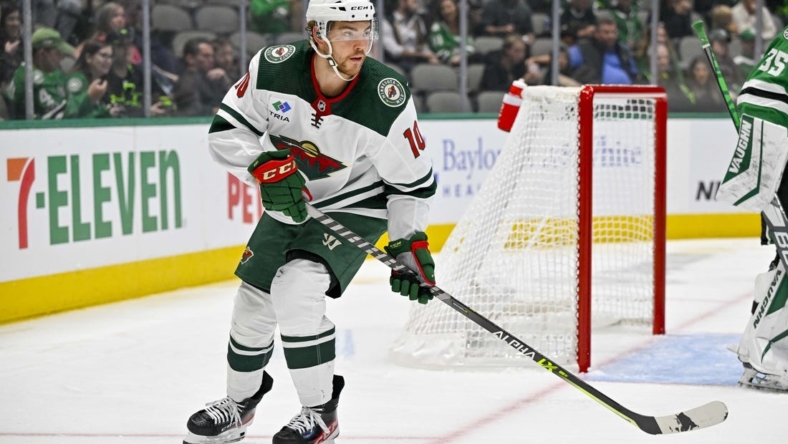 Sep 29, 2022; Dallas, Texas, USA; Minnesota Wild center Tyson Jost (10) in action during the game between the Dallas Stars and the Minnesota Wild at the American Airlines Center. Mandatory Credit: Jerome Miron-USA TODAY Sports