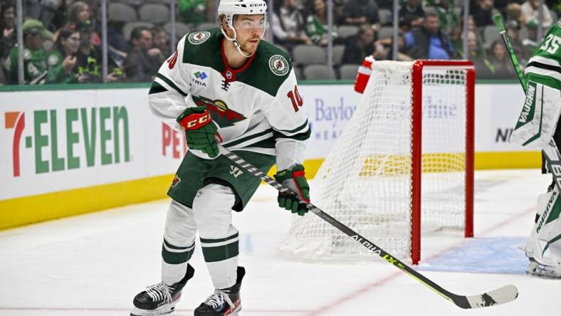 Sep 29, 2022; Dallas, Texas, USA; Minnesota Wild center Tyson Jost (10) in action during the game between the Dallas Stars and the Minnesota Wild at the American Airlines Center. Mandatory Credit: Jerome Miron-USA TODAY Sports