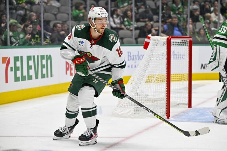 Sep 29, 2022; Dallas, Texas, USA; Minnesota Wild center Tyson Jost (10) in action during the game between the Dallas Stars and the Minnesota Wild at the American Airlines Center. Mandatory Credit: Jerome Miron-USA TODAY Sports