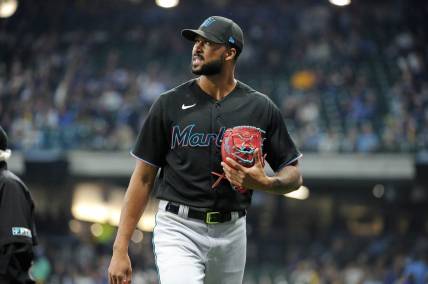 Sep 30, 2022; Milwaukee, Wisconsin, USA; Miami Marlins starting pitcher Sandy Alcantara (22) walks off the field against the Milwaukee Brewers after the seventh inning at American Family Field. Mandatory Credit: Michael McLoone-USA TODAY Sports