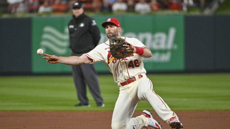 Oct 1, 2022; St. Louis, Missouri, USA; St. Louis Cardinals first baseman Paul Goldschmidt (46) throws from his knees against the Pittsburgh Pirates during the third inning at Busch Stadium. Mandatory Credit: Jeff Curry-USA TODAY Sports