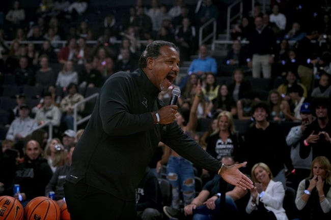 Providence College coach Ed Cooley revving up the Friar fans.