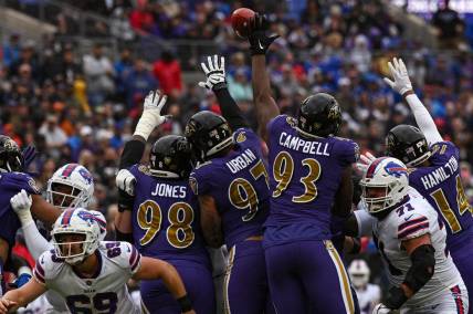 Oct 2, 2022; Baltimore, Maryland, USA;  Buffalo Bills place kicker Tyler Bass (2) first half field goal clears Baltimore Ravens defensive tackle Calais Campbell (93)  tented hand during at M&T Bank Stadium. Mandatory Credit: Tommy Gilligan-USA TODAY Sports