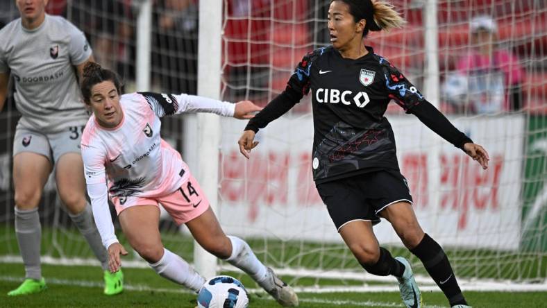 Oct 2, 2022; Bridgeview, Illinois, USA; Chicago Red Stars forward Yuki Nagasato (7) controls the ball during the second half against Angel City FC at SeatGeek Stadium. Mandatory Credit: Daniel Bartel-USA TODAY Sports