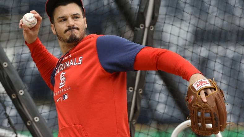 Oct 3, 2022; Pittsburgh, Pennsylvania, USA;  St. Louis Cardinals third baseman Nolan Arenado (28) warms up before the game against the Pittsburgh Pirates at PNC Park. Mandatory Credit: Charles LeClaire-USA TODAY Sports