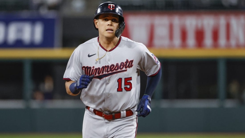 Oct 3, 2022; Chicago, Illinois, USA; Minnesota Twins third baseman Gio Urshela (15) rounds the bases after hitting a two-run home run against the Chicago White Sox during the first inning at Guaranteed Rate Field. Mandatory Credit: Kamil Krzaczynski-USA TODAY Sports