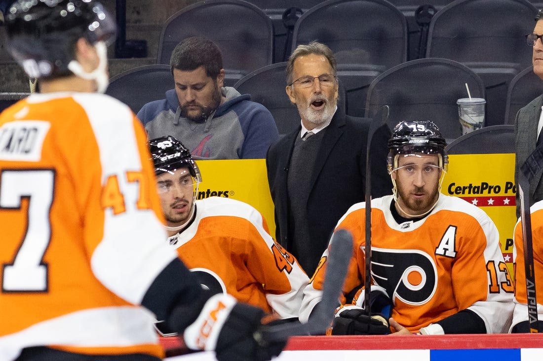 Oct 4, 2022; Philadelphia, Pennsylvania, USA; Philadelphia Flyers head coach John Tortorella talks to his players during the first period against the New York Islanders at Wells Fargo Center. Mandatory Credit: Bill Streicher-USA TODAY Sports