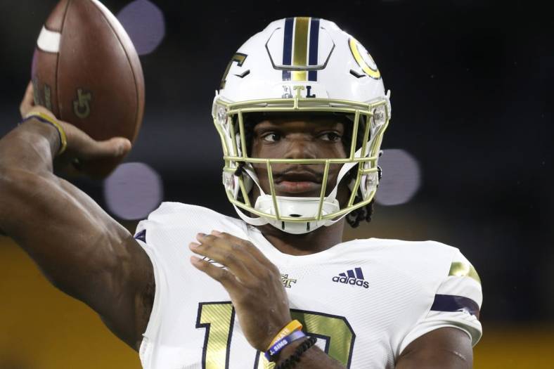 Oct 1, 2022; Pittsburgh, Pennsylvania, USA;  Georgia Tech Yellow Jackets quarterback Jeff Sims (10) warms up before the game against the Pittsburgh Panthers at Acrisure Stadium. Mandatory Credit: Charles LeClaire-USA TODAY Sports