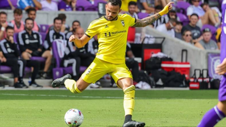 Oct 9, 2022; Orlando, Florida, USA; Columbus Crew midfielder Artur (8) kicks the ball during the first half against the Orlando City at Exploria Stadium. Mandatory Credit: Mike Watters-USA TODAY Sports