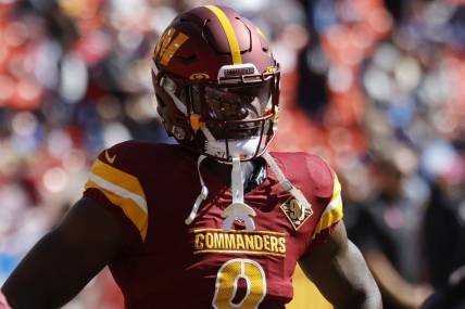 Oct 9, 2022; Landover, Maryland, USA; Washington Commanders running back Brian Robinson (8) stands on the field during warmup prior to the Commanders' game against the Tennessee Titans at FedExField. Mandatory Credit: Geoff Burke-USA TODAY Sports