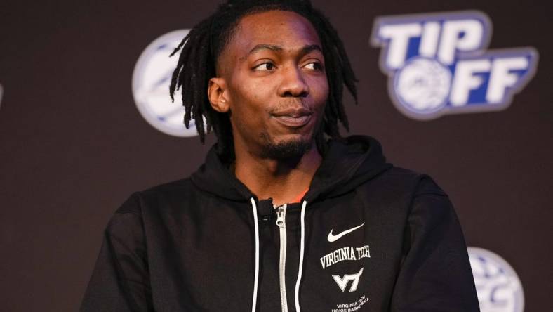 Oct 12, 2022; Charlotte, North Carolina, US; Virginia Tech player Justyn Mutts during the ACC Tip Off media day in Charlotte, NC.  Mandatory Credit: Jim Dedmon-USA TODAY Sports