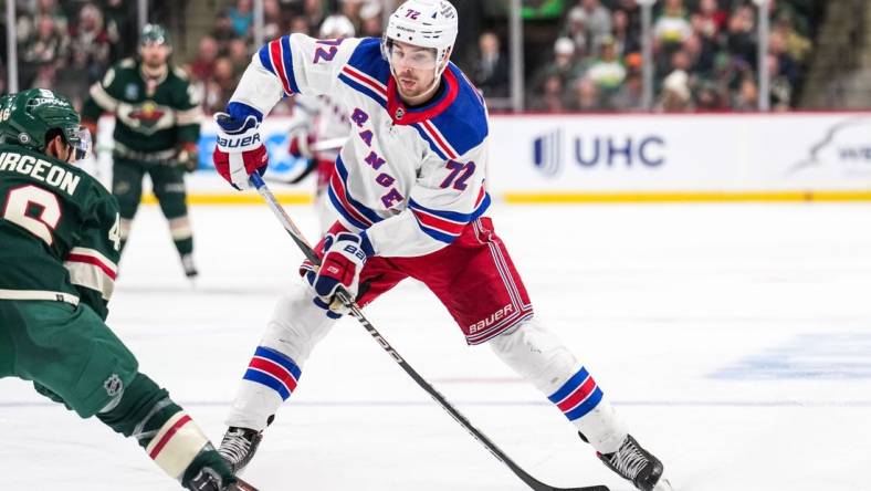 Oct 13, 2022; Saint Paul, Minnesota, USA; New York Rangers center Filip Chytil (72) shoots during the third period against the Minnesota Wild at Xcel Energy Center. Mandatory Credit: Brace Hemmelgarn-USA TODAY Sports