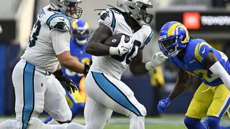 Oct 16, 2022; Inglewood, California, USA; Carolina Panthers running back Chuba Hubbard (30) carries the ball against the Los Angeles Rams in the fourth quarter at SoFi Stadium. Mandatory Credit: Robert Hanashiro-USA TODAY Sports