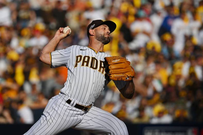 Oct 19, 2022; San Diego, California, USA; San Diego Padres relief pitcher Nick Martinez (21) pitches in the sixth inning against the Philadelphia Phillies during game two of the NLCS for the 2022 MLB Playoffs at Petco Park. Mandatory Credit: Jayne Kamin-Oncea-USA TODAY Sports