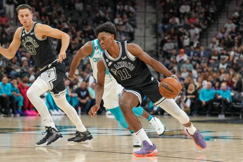 Oct 19, 2022; San Antonio, Texas, USA;  San Antonio Spurs guard Joshua Primo (11) dribbles the ball in the first half against the Charlotte Hornets at  the AT&T Center. Mandatory Credit: Daniel Dunn-USA TODAY Sports