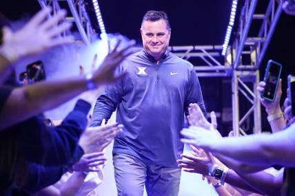 Xavier Musketeers head coach Sean Miller walks out as he is introduced during Xavier Basketball        s Musketeer Madness on Friday, Oct. 21, 2022 at the Cintas Center in Cincinnati.

Ncaa Basketball Xavier Musketeer Madness
