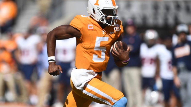 Tennessee quarterback Hendon Hooker (5) scrambles out of pocket during the NCAA college football game against UT Martin on Saturday, October 22, 2022 in Knoxville, Tenn.

Utvmartin1012
