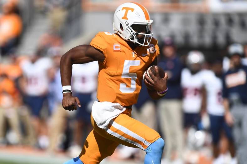 Tennessee quarterback Hendon Hooker (5) scrambles out of pocket during the NCAA college football game against UT Martin on Saturday, October 22, 2022 in Knoxville, Tenn.

Utvmartin1012