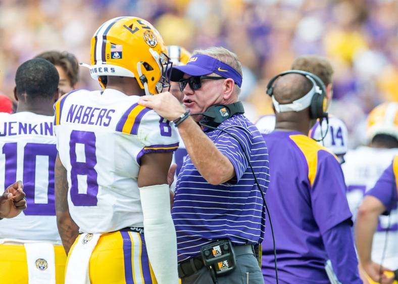 Head Coach Brian Kelly talking with Malik Nabers on the sideline as the LSU Tigers take on the Ole Miss Rebels at Tiger Stadium in Baton Rouge, Louisiana, USA.Saturday October 22, 2022

Lsu Vs Ole Miss Football V1 7925