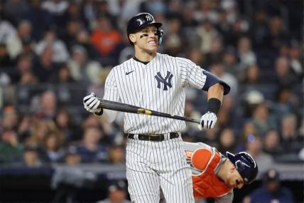 Oct 22, 2022; Bronx, New York, USA; New York Yankees right fielder Aaron Judge (99) reacts after striking out in the sixth inning against the Houston Astros during game three of the ALCS for the 2022 MLB Playoffs at Yankee Stadium. Mandatory Credit: Brad Penner-USA TODAY Sports