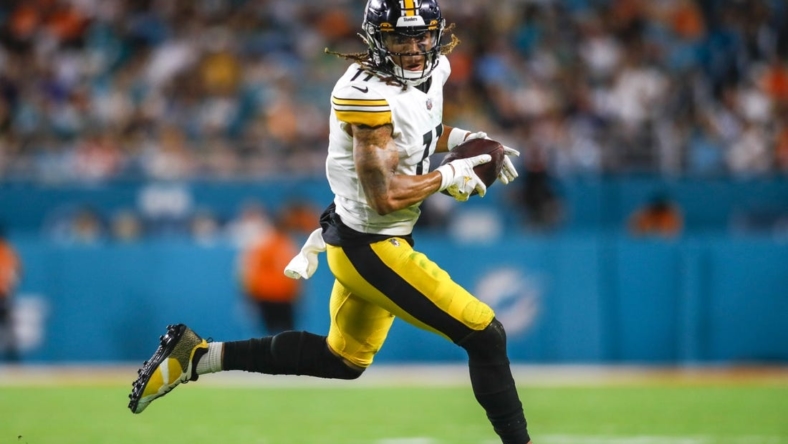 Oct 23, 2022; Miami Gardens, Florida, USA; Pittsburgh Steelers wide receiver Chase Claypool (11) runs with the football during the second quarter against the Miami Dolphins at Hard Rock Stadium. Mandatory Credit: Sam Navarro-USA TODAY Sports